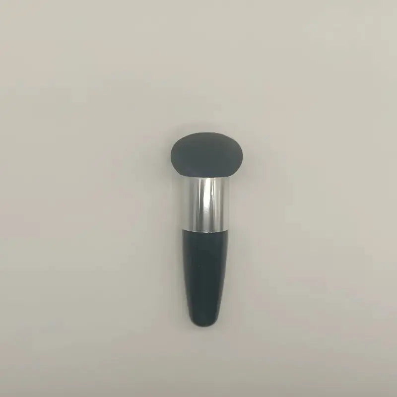 Accessoire fond de teint avec manche long
